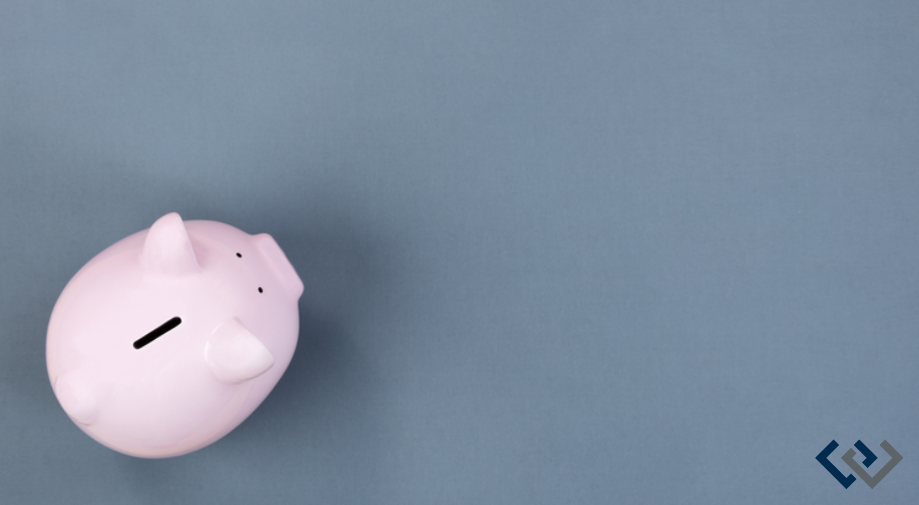 pink piggy bank on a grey background
