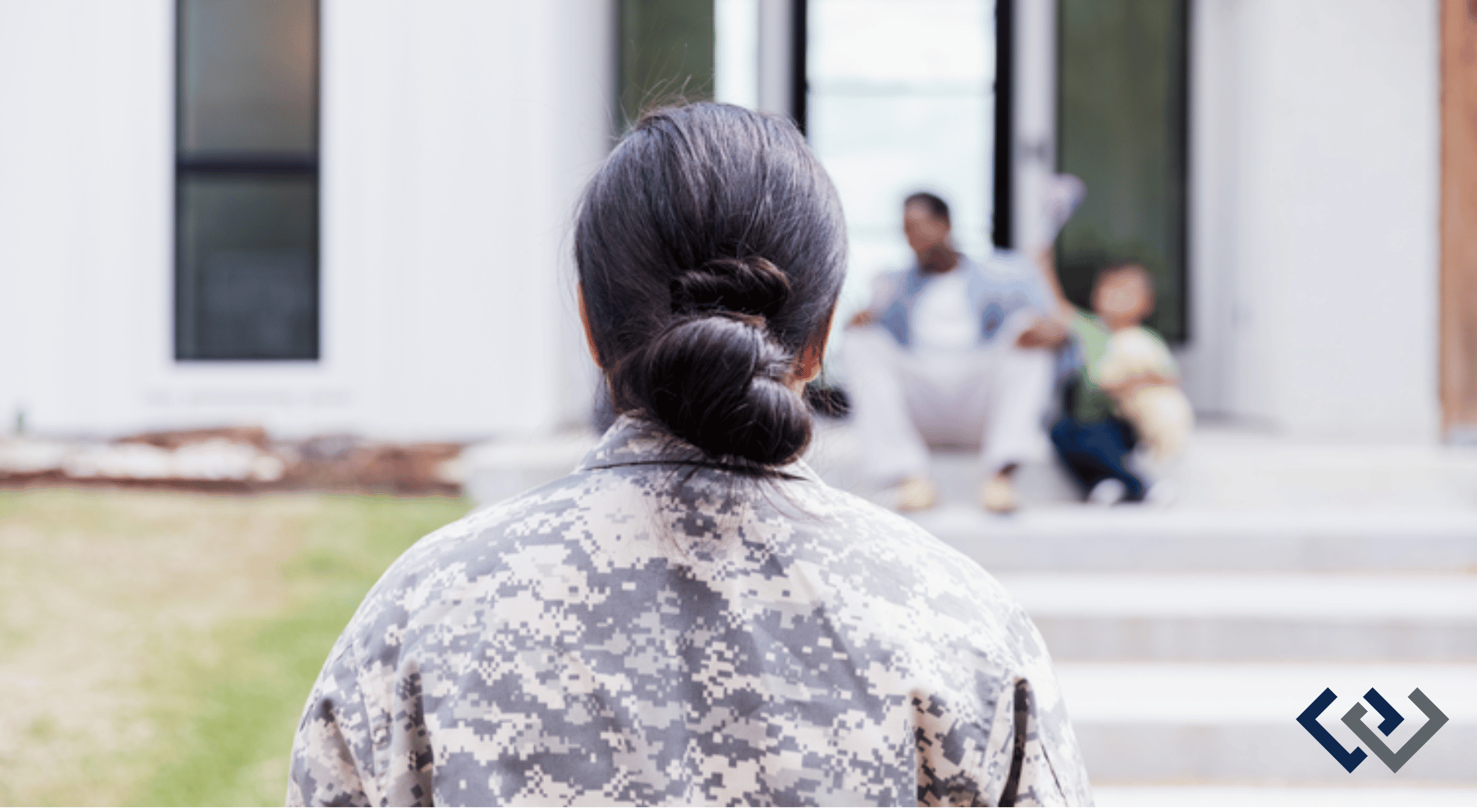 The back of a person, wearing a military uniform, facing a group of people sitting on porch steps